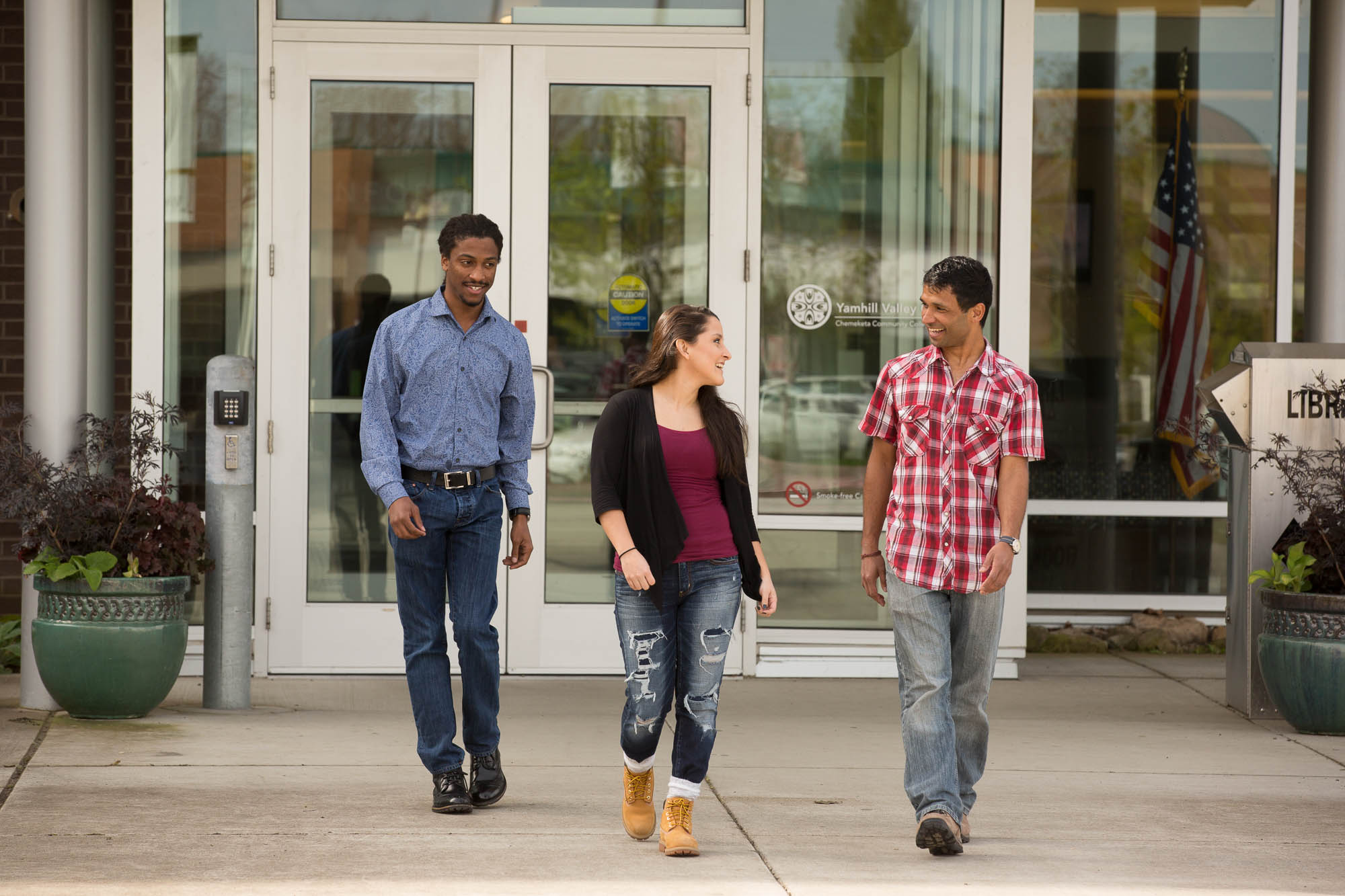 Students walking out from the entrance of the Chemeketa Yamhill Valley Campus.