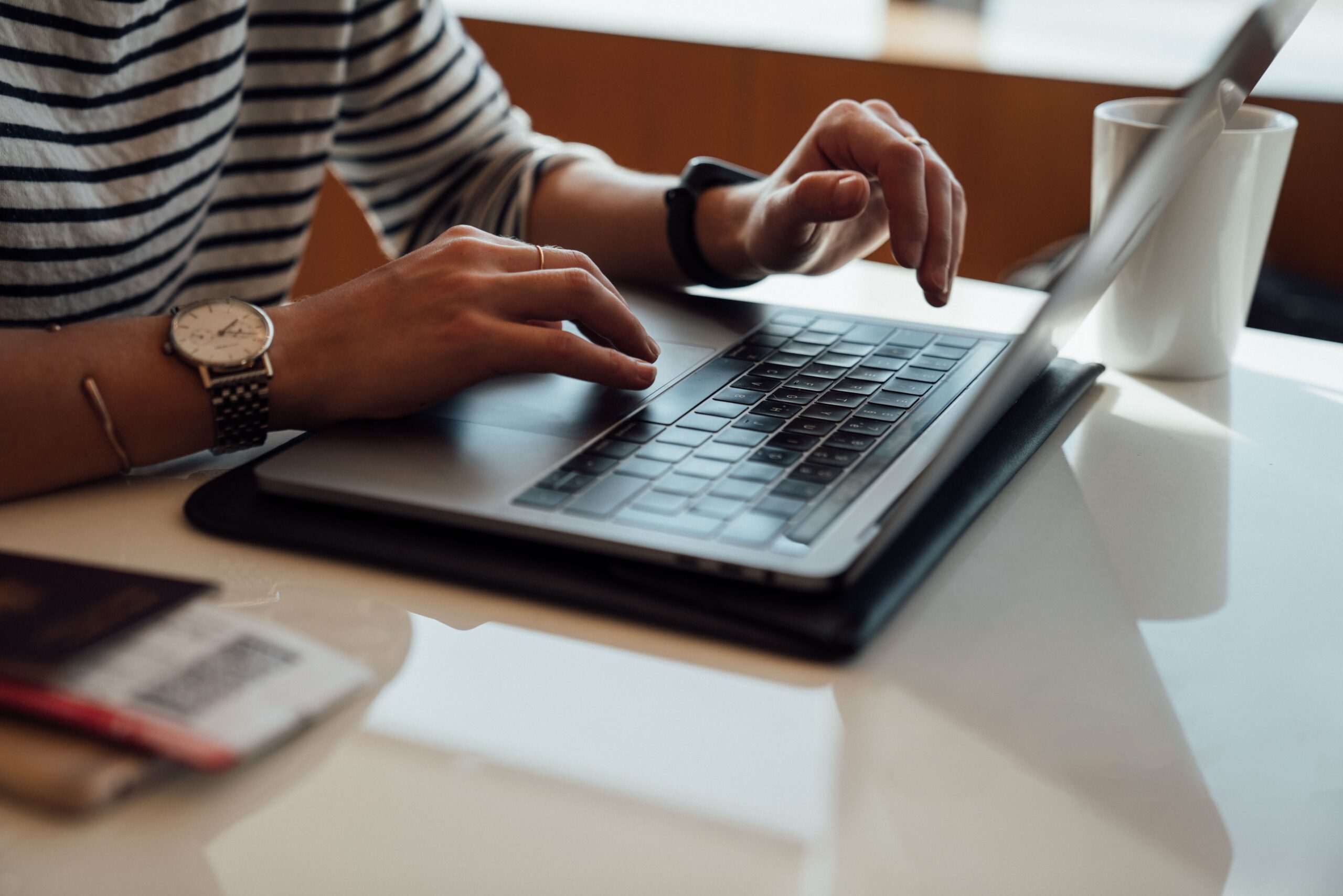 Person sitting at a laptop.